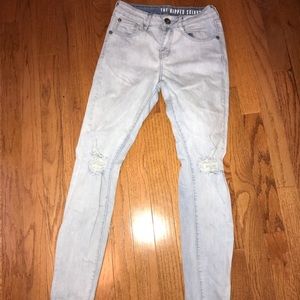 Light wash ripped skinny jeans